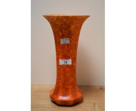 A Pilkington Royal Lancastrian octagonal pottery vase having orange mottled glaze, impressed marks to base, h27