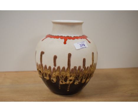 A vintage West German ceramic vase of lobbed form having brown and red patterns on a beige ground, w15cm x h20cm
