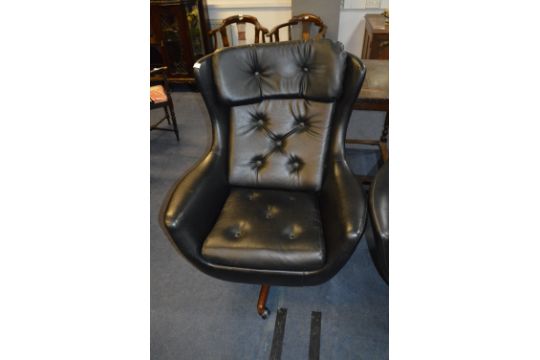 1960 S 70 Black Vinyl Swivel Armchair With Teak Legs Black Vinyl Swivel Armchair With Teak Legs