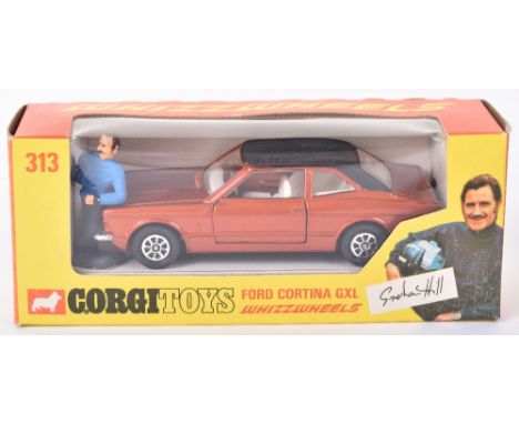 Corgi Toys 313 Graham Hills Ford Cortina GXL, metallic bronze body, mat black roof, Whizzwheels, with Graham Hill figure, in 