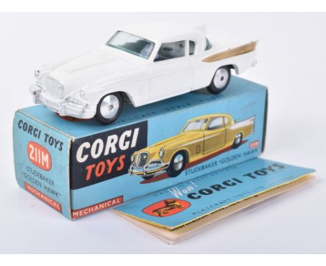 Corgi Toys 211M Studebaker “Golden Hawk” white body, gold rear wing flashes, flat spun wheels, in excellent original conditio