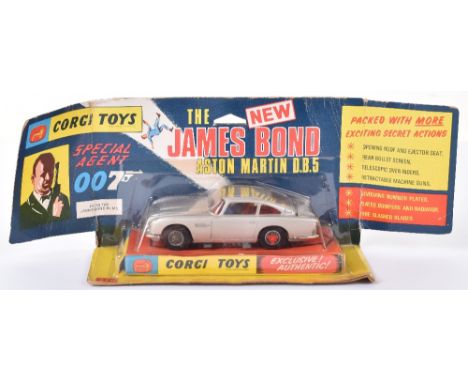 Corgi Toys 270 James Bond Aston Martin 1st Edition silver with tyre slashers, revolving number plates, rear bullet screen, re