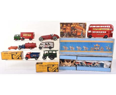 Quantity Of Mixed Toys, including: five Triang Minic, tinplate toys, LCC Ambulance, Tipping lorry, Petrol tanker, Traction En