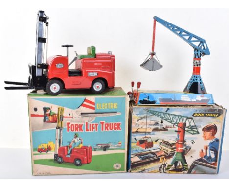 Masudaya boxed Electric Fork Lift truck, 1960s, battery operated red tinplate fork lift truck, picture lid box with inner pac