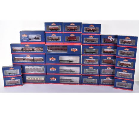 Bachmann coaches and wagons, boxed three BR MK1 coaches, two 3xcattle wagon sets (weathered), three bogie wagons, Wickham tro
