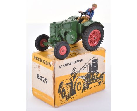 Marklin 8029 Lanz Bulldog Tractor, green body, red wheel hubs, with driver, in near mint original condition, original box is 
