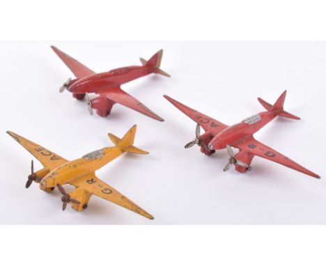 Three Dinky Toys 60g Light Racers Aircraft red/silver, yellow/silver G-R ACE, plus red/gold, all in fair to good original con