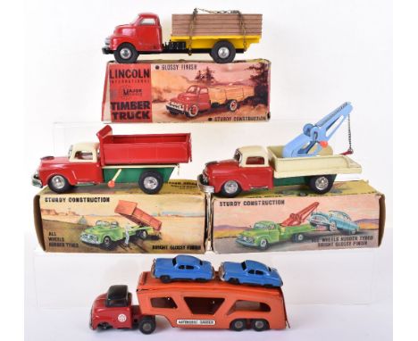 Three boxed Empire Made tinplate toy Trucks, 1960s, Dump truck and Breakdown truck both with friction drive motors, both 18cm