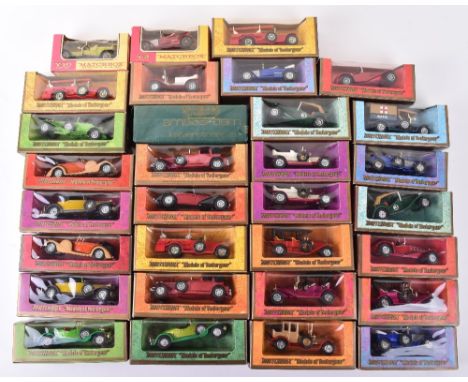 Thirty-one boxed Matchbox Models Of Yesteryear, pink and yellow window boxes Y-2 1914 Prince Henry Vauxhall, Y-10 1909 Rolls 