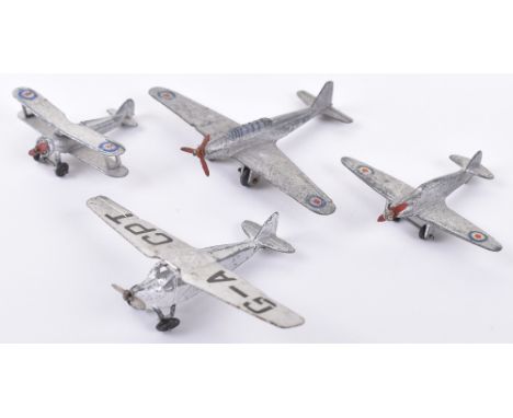 Four Dinky Toys Aircraft, 60b De Havilland Leopard Moth, silver body, G-A CPT, part of one undercarriage loose,60p Gloster Gl