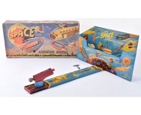 Rare Codeg (Gt.Britain) Clockwork Tinplate Space Shooting Range, tinplate spaceships move along a belt and pulleys, across a 
