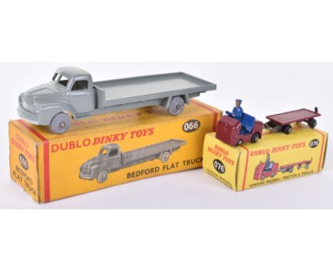 Two Dublo Dinky Toys, 066 Bedford Flat Truck, grey body, grey plastic wheels and 076 Lansing Bagnall Tractor Trailer, maroon 