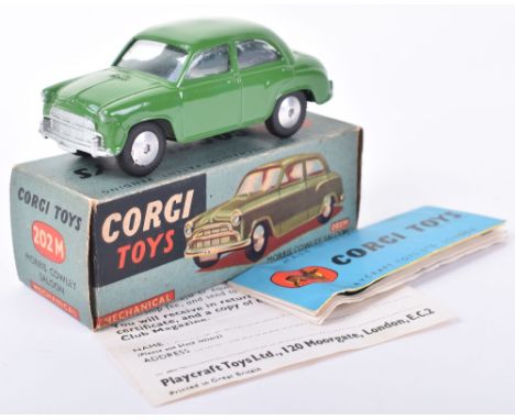 Corgi Toys 202M Morris Cowley Saloon, green body, flat spun wheels, in mint original condition, with working mechanical mecha