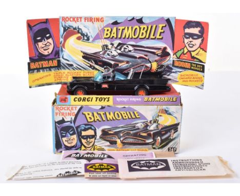 Boxed Corgi Toys 1st issue 267 Rocket Firing Batmobile, gloss black, red bat hubs, blue tinted windscreens, with "Batman &amp