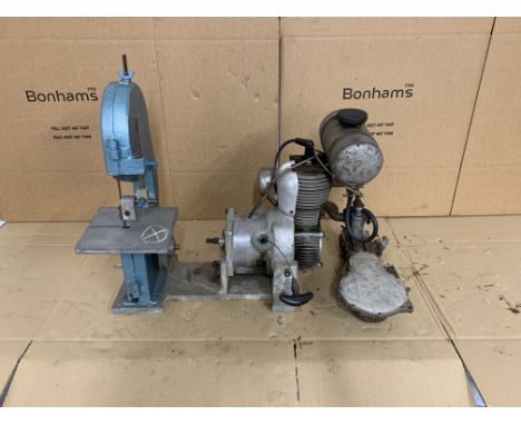 A Vincent stationary enginetogether with a bansaw attachment, and a Vincent Firefly engine, condition and completeness unknow