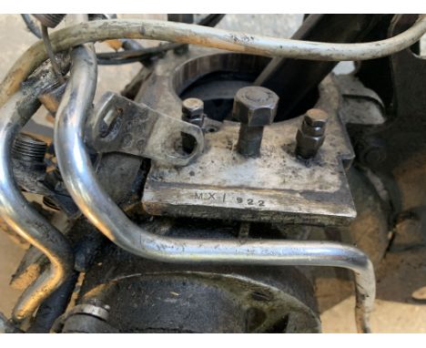 An incomplete Matchless MX enginenumbered MX\922, believed water-cooled side valve, condition and completeness unknown, close