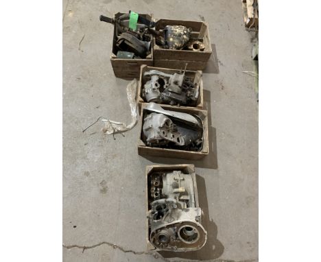 A quantity of Triumph partsincluding crankcases, oil tanks, cylinder barrels, footrests, toolbox, swinging arm, gearbox, prim