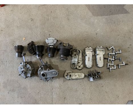A quantity of believed Vintage AJS engine componentsincluding bottom ends (one numbered H80940, another unnumbered), cylinder