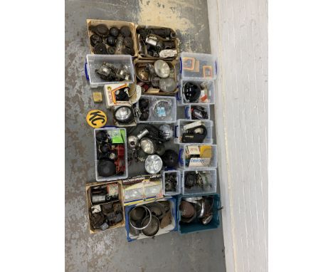 A quantity of mainly electrical partsincluding headlamps; headlamp shells; regulators; alternators; ignition coils; horns and