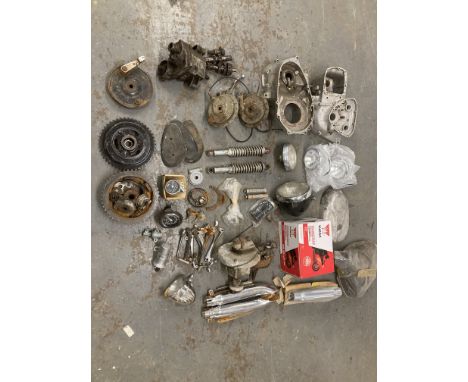 An Autojumblers Lotcomprising believed Royal Enfield twin rear sprockets and brake plate, Triumph 650 crankcases numbered TR6