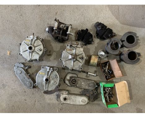 A quantity of believed Vintage AJS engine componentsincluding crank cases (numbered C7 8355, M6/104355, H6/100916), cylinder 