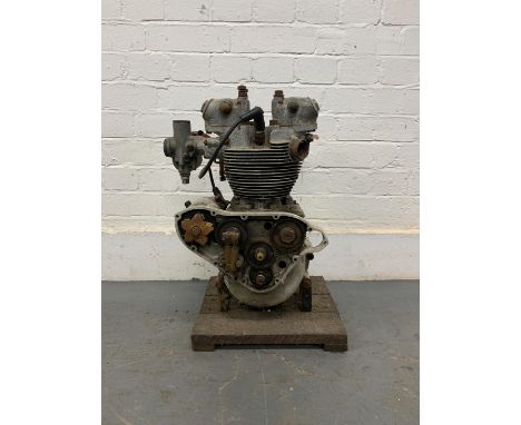 A Triumph enginemounted on wooden base numbered TR5 1776 NA, condition and completeness unknown, close inspection advised. Lo