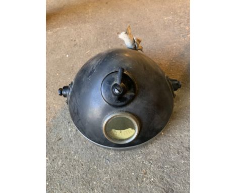 A Miller 8 inch headlampcomplete with switch, ammeter, rim and glass, condition and completeness unknown, close inspection ad
