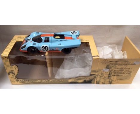 Auto Art: A boxed 1:18 scale Steve McQueen Porsche 917K from the film ‘Le Mans’, some box damage as shown.