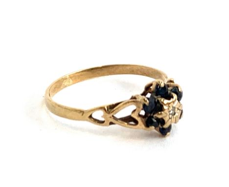 A 9ct gold sapphire and diamond ring, the band with pierced heart design, size O approx. 1.3g 