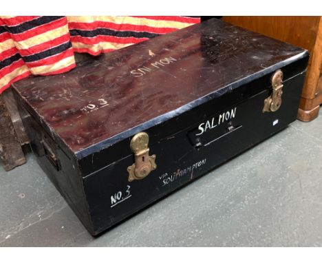 A black painted metal travel trunk, with loop carry handles, marked Salmon No.3, 92cmW 