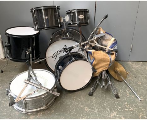 A child's drum kit by Stagg; together with an Aria snare drum 