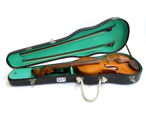 A full sized viola; together with two bows and a quantity of music 