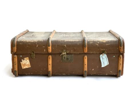 An Army and Navy woodbanded canvas travel trunk, marked Lt. W. J. Greener, 34th Sikh Pioneers 