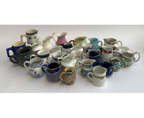 A mixed lot of 29 jugs, to include Tonquin by Myott, Staffordshire, Royal Doulton 'Stanwyck'; Royal Stafford; T. Goode; Royal