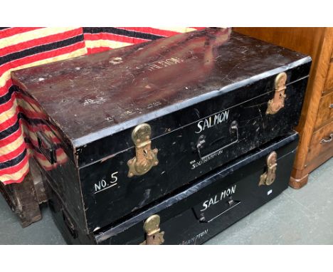 A black painted metal travel trunk, with loop carry handles, marked Salmon No.5, 92cmW 