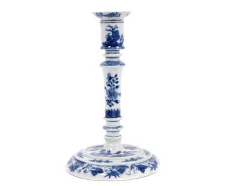 Scarce 18th century Chinese export blue and white candlestick of ringed taper form, on domed circular foot, painted with Chin