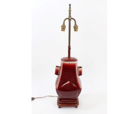 Chinese flambé hu-shaped vase converted to table lamp on wood stand, 71cm high   CONDITION REPORT  Overall crazing to glaze, 