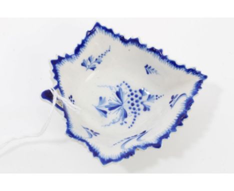 18th century Derby leaf-shaped pickle dish with triangular stalk handle and serrated rim, painted in dry-blue enamel with flo