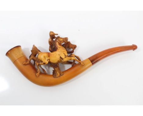 Late 19th century meerschaum pipe carved with Jockey with two horses, with amber mouthpiece, in fitted case, 19.5cm