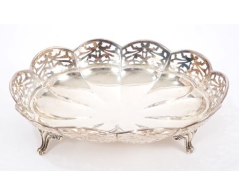 1920s silver dish of lobed oval form, with pierced border, on four scroll feet (London 1925), maker - C. & R. C.  All at appr