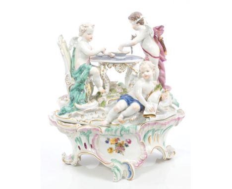 Fine 18th century Meissen figure group of cherubs and a blindfold Cupid picking names out of a bowl, on rococo scroll and flo