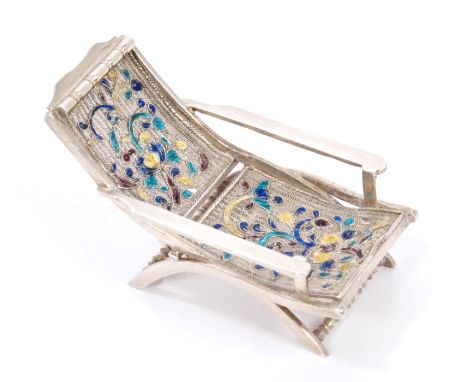 Late 19th / early 20th century Chinese silver model of a deck or planters' chair with long arms and cloisonné enamel floral d