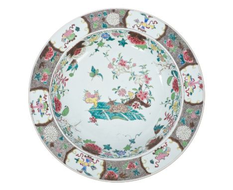 Large 18th century Chinese export basin dish, circa 1740, painted in famille rose palette with resting deer and flowering tre