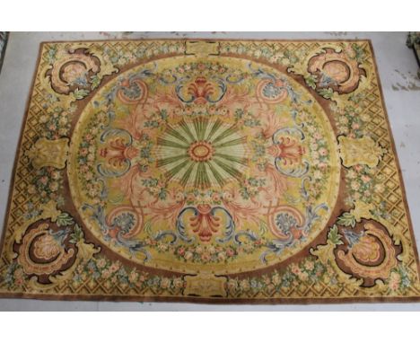 Large Aubousson-style wool pile carpet with central oval neoclassical medallion and flower, shell and scroll ornament in russ