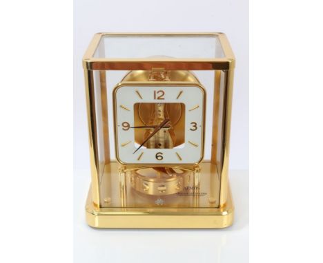 Jaeger-LeCoultre calibre 540 Atmos clock with white square dial and Arabic numerals.  Serial no. 649265, in a gilt metal case