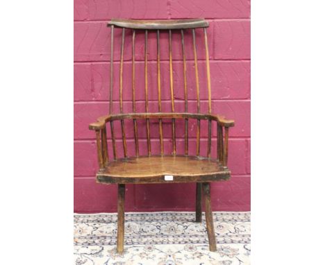 Rare 19th century primitive Welsh ash and elm comb back elbow chair with spindle back and swept arms, on turned legs (one leg