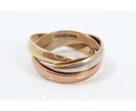 Three-colour 9ct gold 'Russian' wedding ring with three interlocking bands CONDITION REPORT To fit finger size approximately 