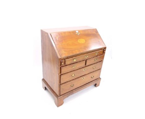 18th century walnut crossbanded and patera inlaid bureau with sloping fall enclosing fitted interior or short drawers and pig
