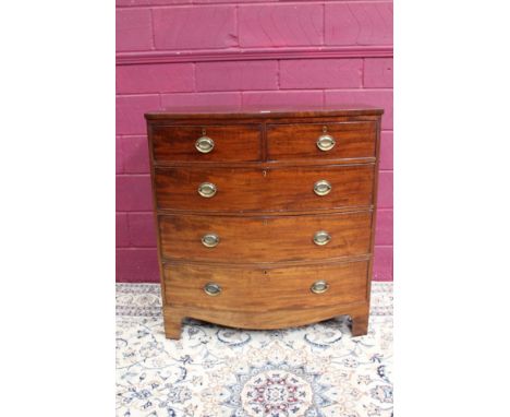 Late Regency mahogany bow front chest, having two short over three long graduated drawers, on splayed bracket feet, 102cm wid