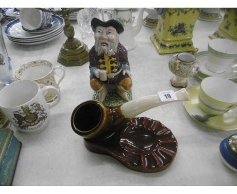 MELBA WARE TOBY JUG AND POTTERY NOVELTY PIPE STAND